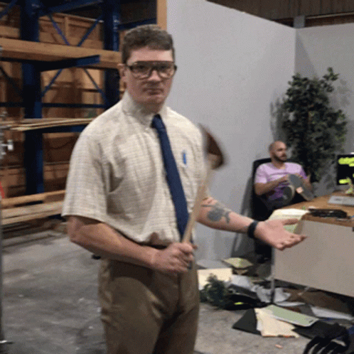 Office Man Holding Hit Stick GIF