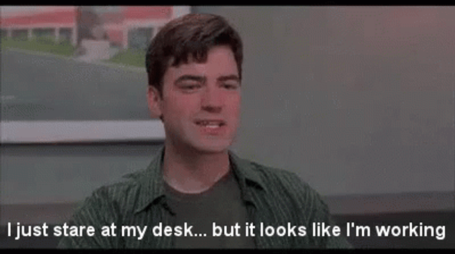 Office Space Peter Gibbons Stare At His Desk GIF