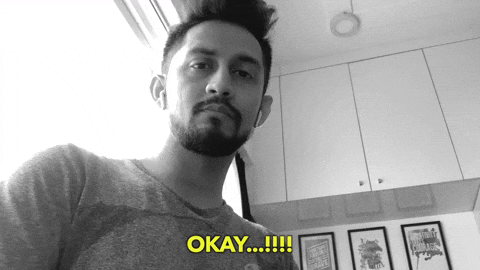 Ok Ok Skeptic Reaction Thumbs Up GIF