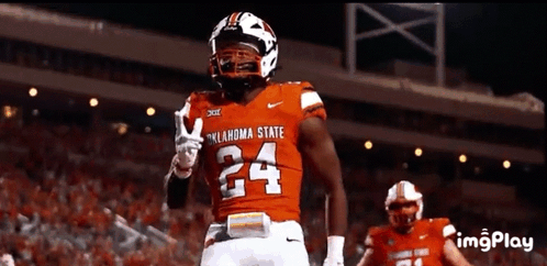 Oklahoma State Football Player Giving Peace Sign GIF