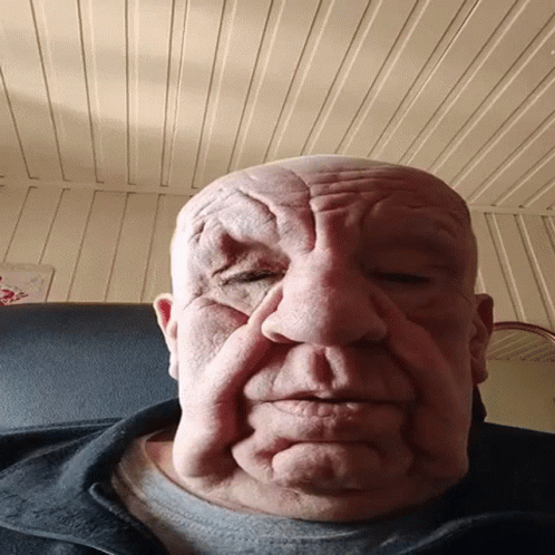 Funny Wrinkled Old Man Face Close Up GIF