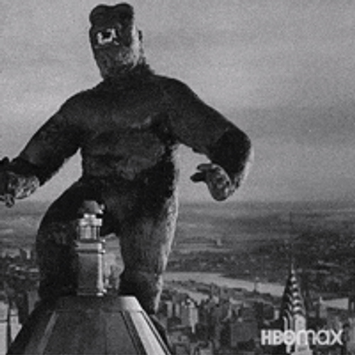 Old King Kong Movie Catching Chopper From Building GIF