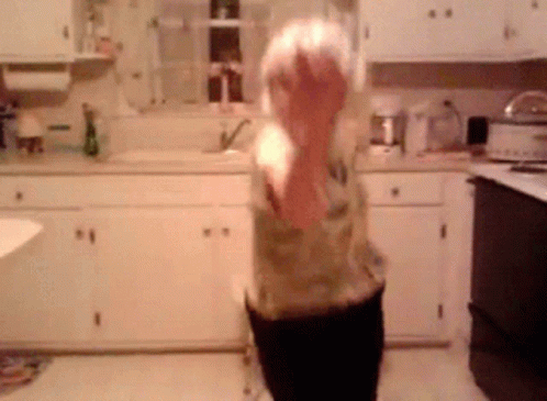 Old Lady Yoga Dancing In Kitchen GIF