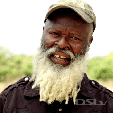 Old Man From Zambia Winks GIF