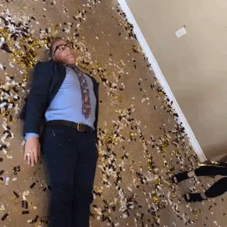 Old Man Lying Down Pouring Glitter Bomb GIF