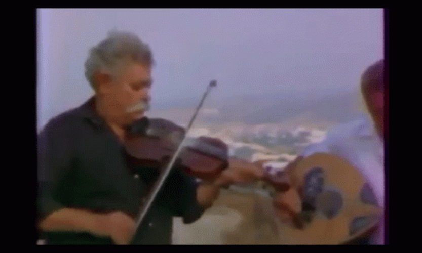 Old Man Playing Worlds Smallest Violin GIF
