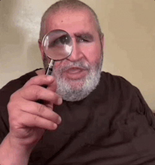 Old Man With Magnifying Glass GIF