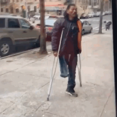 Old Men In Crutches Fighting Young Man GIF