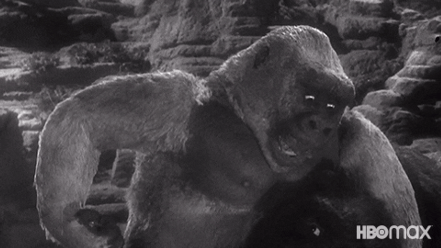 Old Movie King Kong Hitting Giant Monster Rapidly GIF