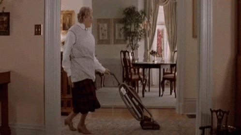 Old Woman Dancing With Vacuum GIF