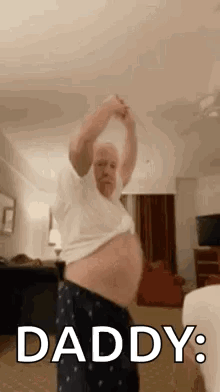 Older Man Dancing with Arms Up