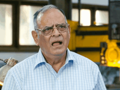 Older Man In Blue Shirt And Glasses Funny Face GIF