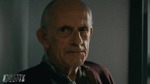 Older Man Looking at Camera With Nobody Ad