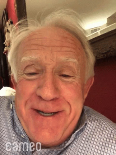 Older Man Smiling With Cameo GIF