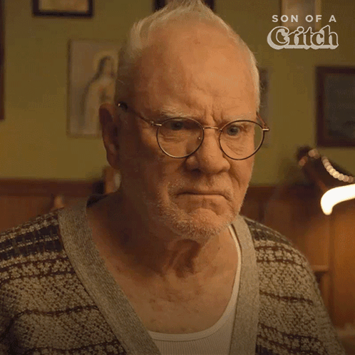 Older Man with Glasses Asking What's Your Rush