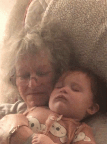 Older Woman Holding Baby
