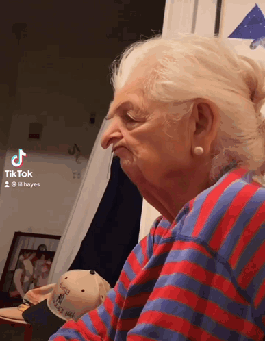 Older Woman in Red and Blue Striped Shirt TikTok Account lilihayes