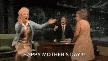 Older Women And Man In Suit At Table GIF