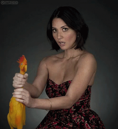Olivia Munn Holding Chickens Neck GIF