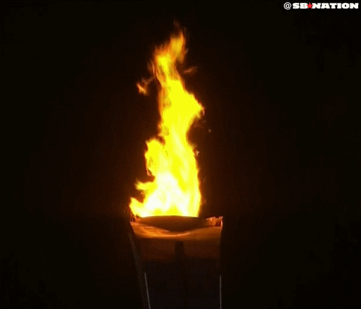 Olympic Torch In The Dark GIF