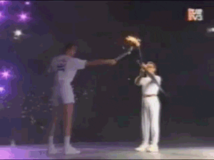 Olympic Torch Lit With Arrow GIF