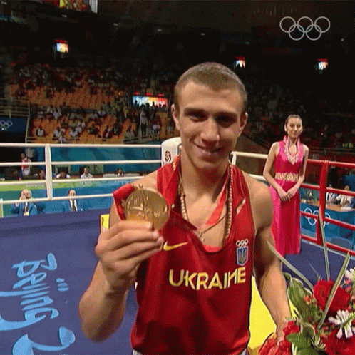 Olympics Kissing Medal GIF