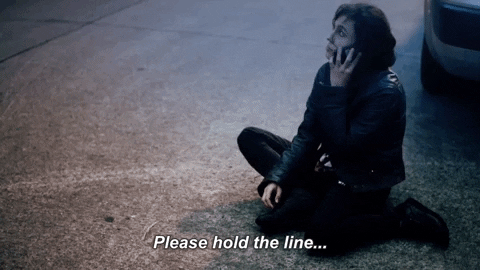 On Hold Woman Sitting On The Road GIF