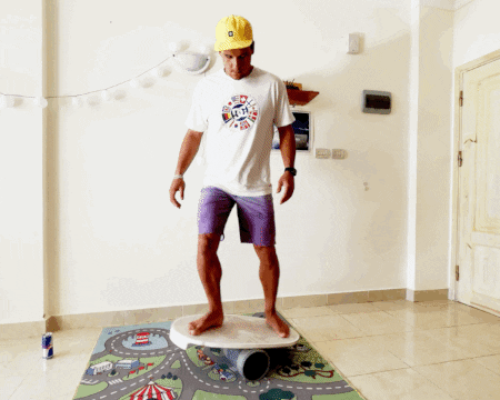 One Foot Paddle Boarding On Balance Beam GIF