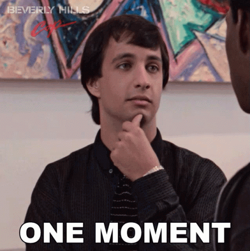 One Moment Beverly Hills Cop Bronson Pinchot GIF