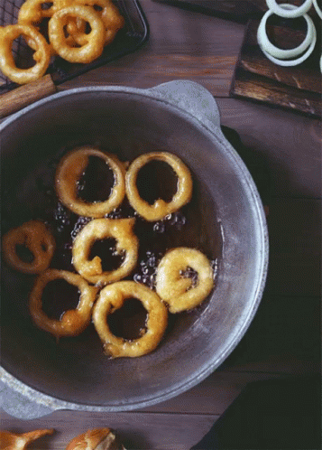 Onion Rings Cooking in Skillet