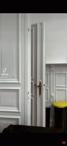 Open Door To Room With Trash Can GIF
