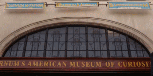 Opening Banners Outside Museum GIF