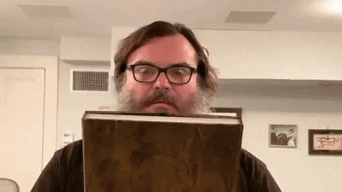 Opening Book That Shines Like Gold GIF