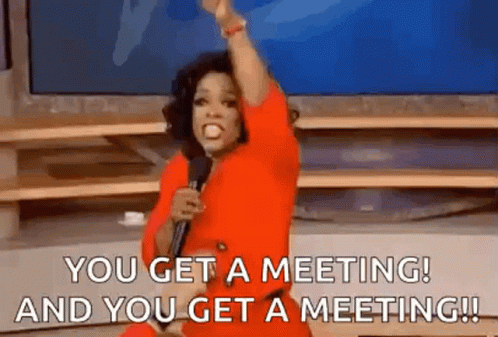 Oprah Winfrey Holding Microphone Saying You Get a Meeting
