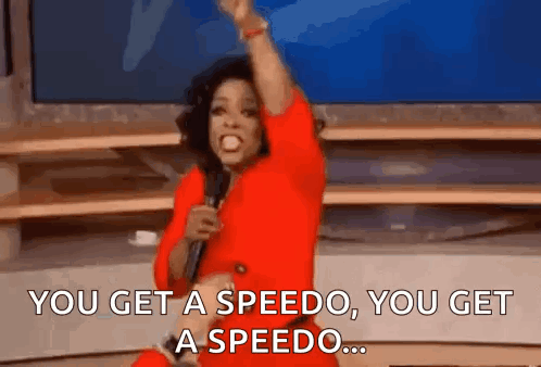 Oprah Winfrey Is Holding A Microphone And Saying You Get A Speedo You Get A Speedo . GIF