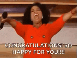 Oprah Winfrey Is Holding A Microphone With Her Arms In The Air And Shouting Congratulations ! So Happy For You !!! GIF