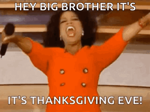 Oprah Winfrey Is Holding A Microphone With Her Arms In The Air GIF
