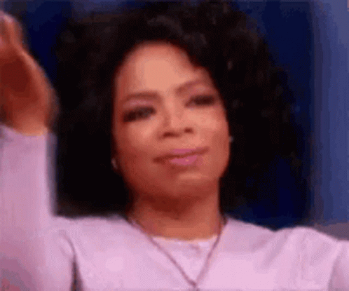 Oprah Winfrey Smiling and Making Funny Face