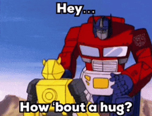 Optimus Prime Hugging Bumblebee GIF