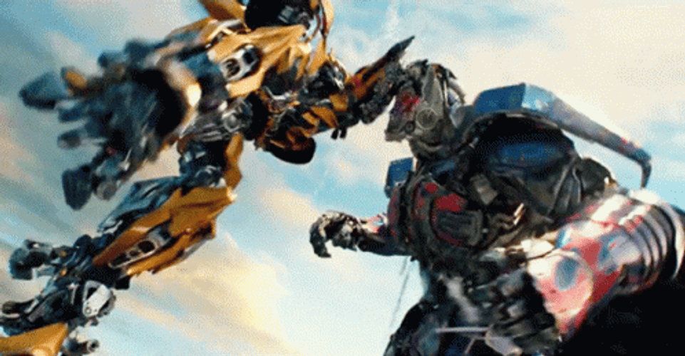Optimus Prime Fighting Bumblebee GIF