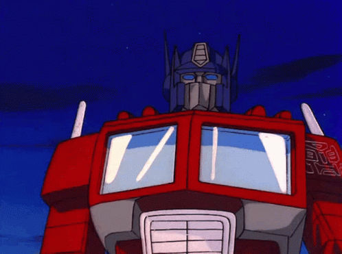 Optimus Prime Holding Up Arrow