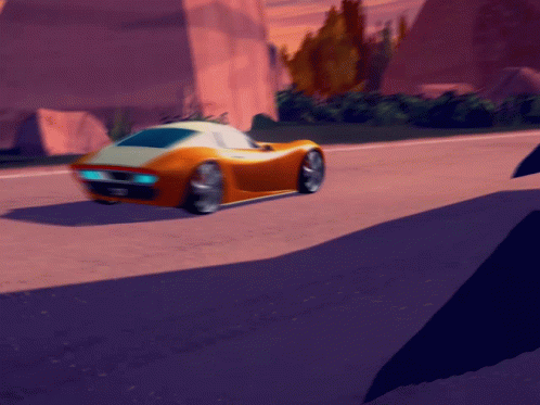 Orange and White Sports Car Driving Down Road