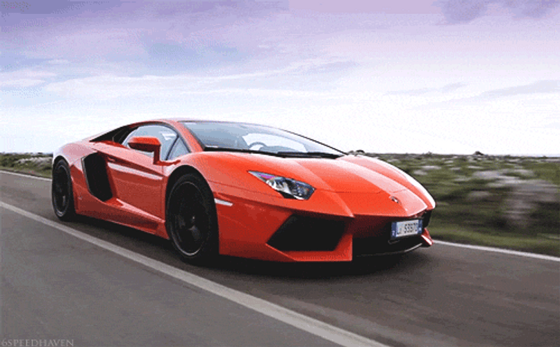 Orange Lamborghini On The Road GIF