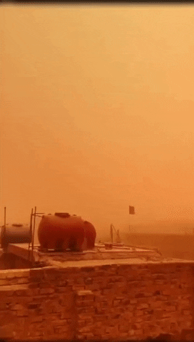 Orange Sky Dust Storm Waving Flag GIF