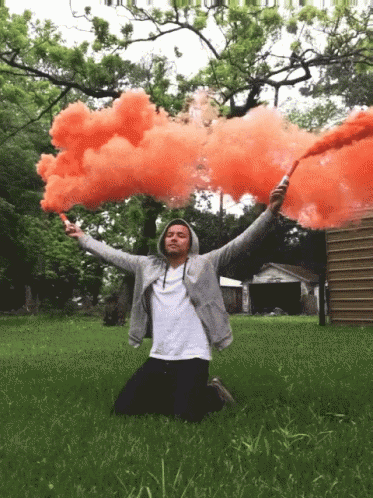 Orange Smoke Signals Kneeling Guy GIF