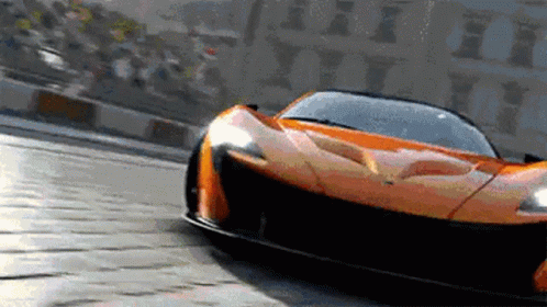 Orange Sports Car Driving