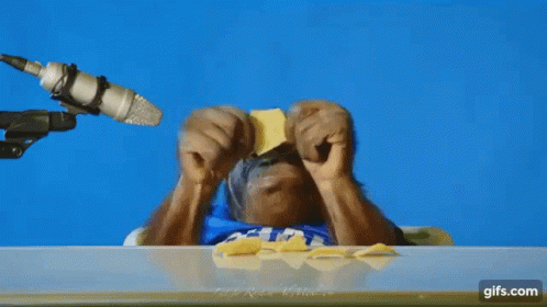 Orangutan Munching On Chips GIF
