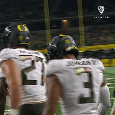 Oregon Ducks Football Team Assisted Jump GIF