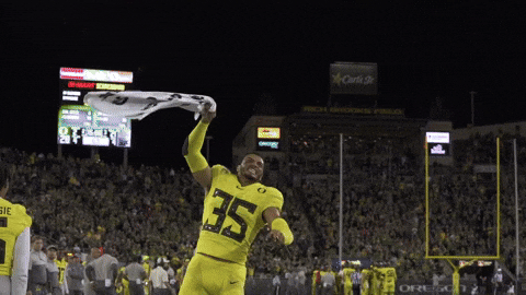 Oregon Football Athlete Twirling Flag GIF