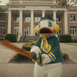 Oregon Mascot Puddles Wielding A Chain Saw GIF